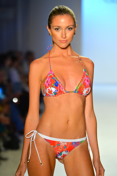 A model walks the runway at the Caffe Swimwear show - Foto, imagen