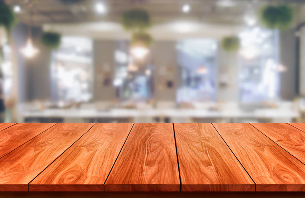 Mesa de madera en el fondo borroso del restaurante moderno
 - Foto, Imagen