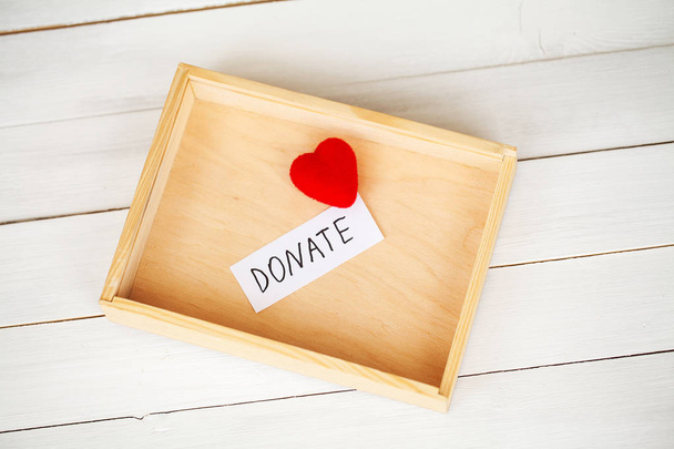 Donations and Charity. Donation Concept. A Donation Box on the White Background. - Photo, Image