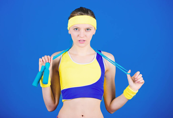 Full of energy. Health diet. Success. Sporty woman training in gym. Happy woman workout with jump rope. Strong muscles and power. Sport skipping rope equipment. Athletic fitness. energy for training - Fotografie, Obrázek