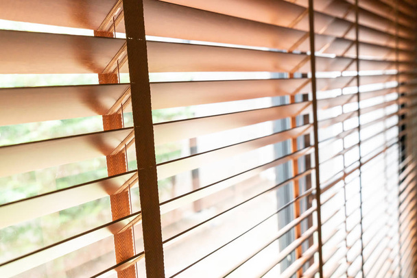 Wooden shutters on the window in the living room - Foto, imagen