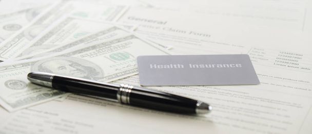 health insurance card and bank note and pen on background of gen - Photo, Image