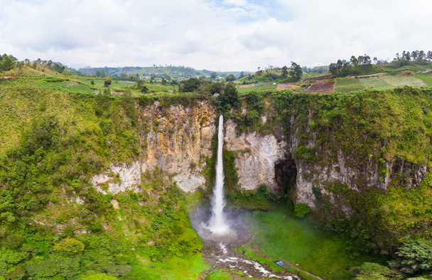 Aerial view Sipiso-piso waterfall in Sumatra, travel destination in Berastagi and Lake Toba, Indonesia.  - Photo, Image