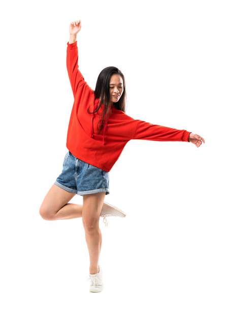 Young asian dancer over isolated white background - Zdjęcie, obraz