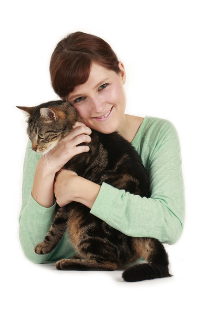 Young woman with tabby cat - Fotó, kép