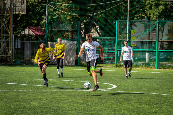MOSCOW, RUSSIA - AUGUST 24, 2019: Soccer players in game. Amateur league in Moscow. - Photo, Image