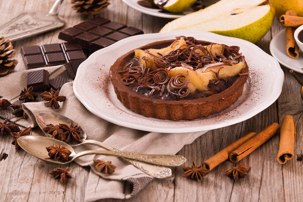 Pear and chocolate tart. - Фото, изображение