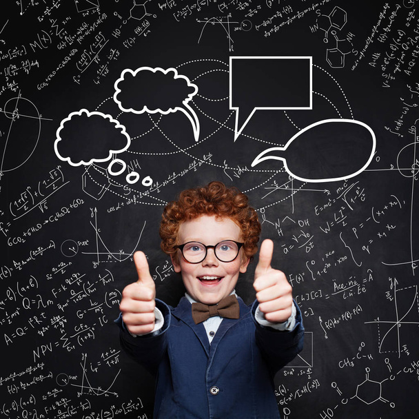 Happy smart child student on blackboard background with science  - Photo, Image