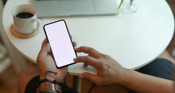 Cropped view of man's hands holding blank screen smartphone - Photo, Image