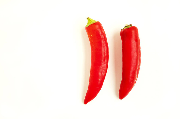 Red chili peppers isolated on white background - Fotografie, Obrázek