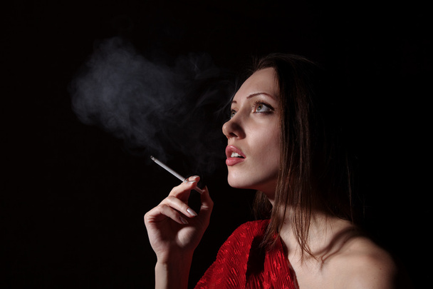 Portrait of the smoking woman - Foto, afbeelding