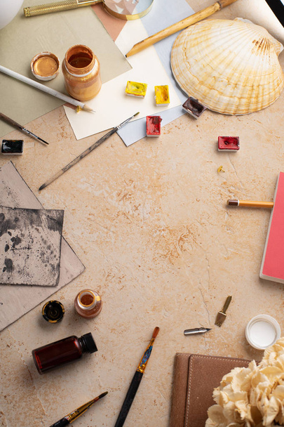 Artist workspace with art equipment on rustic background. Top view   - Photo, Image