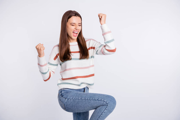 Charming lady raising hands up yelling loud wear striped pullover isolated white background - Foto, afbeelding