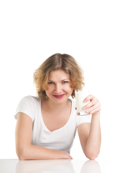 Woman with a glass of milk - Фото, зображення