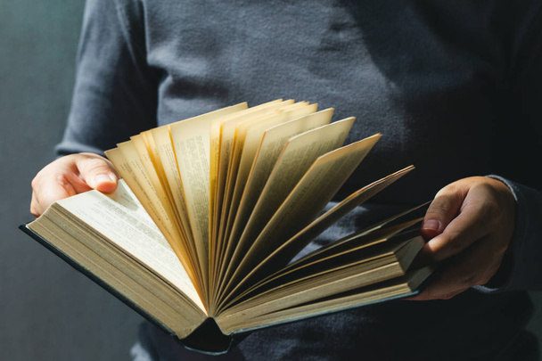 Education and book concept.woman holding open book - Photo, Image