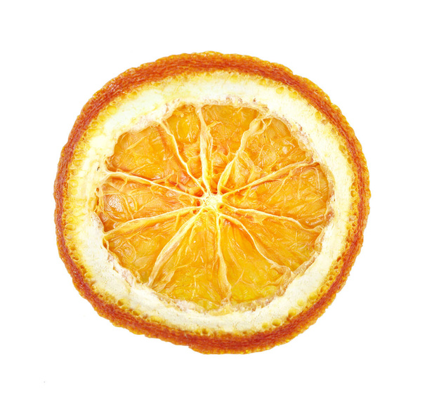 Slice Of Dried Orange Isolated On White. - 写真・画像
