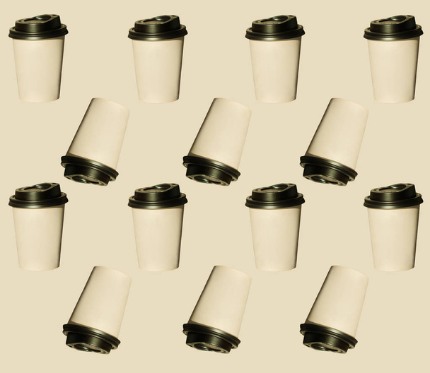 Coffee to go, regular pattern made of photography. Kraft paper cups with black lids. Lifestyle concept. - Photo, Image