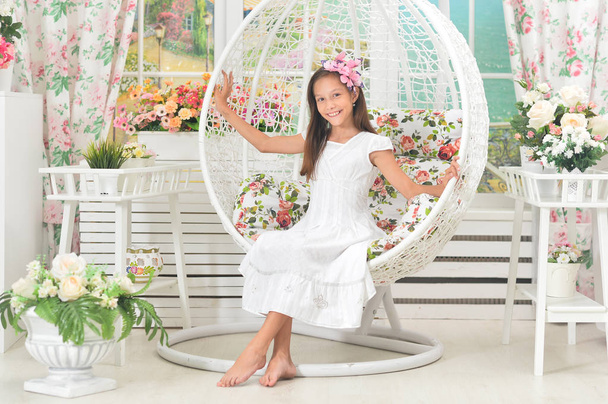 Emotional little girl in white dress  posing - Photo, image