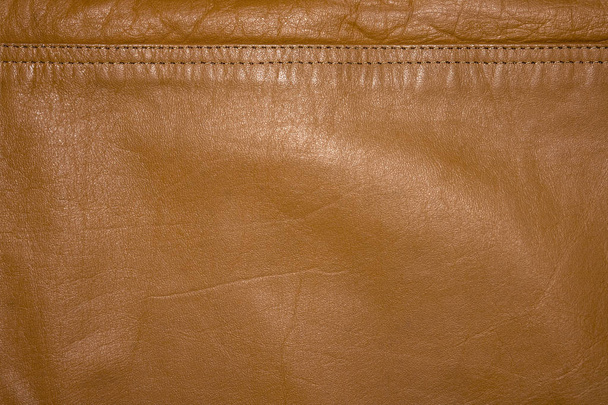 Background, leather texture with a stitched seam. - Photo, Image