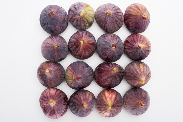 top view of ripe whole delicious figs on white background - Foto, afbeelding