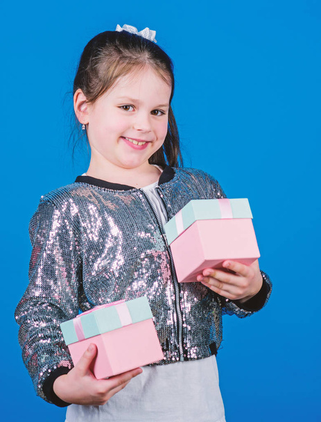 Special happens every day. Girl with gift box blue background. Black friday. Shopping day. Cute child carry gift box. Surprise gift box. Birthday wish list. World of happiness. All eyes on you - Фото, зображення