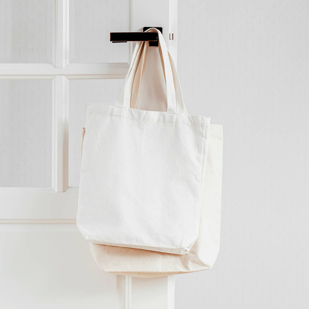White eco bag mockup. Blank Shopping sack with copy space. Canvas tote bag. Eco friendly / Zero waste concept. - Fotó, kép