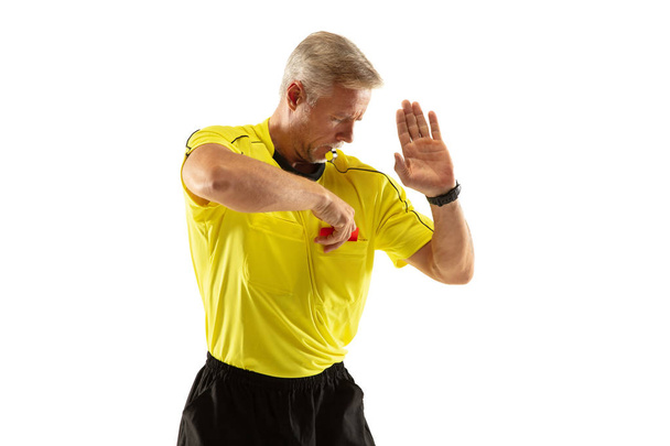 Football referee showing a red card to a displeased player isolated on white background - Photo, Image