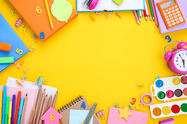 Different school supplies on yellow background - Photo, Image