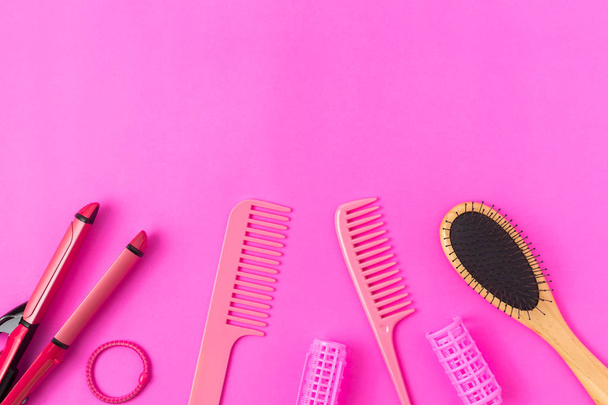 Comb on a Pink background - 写真・画像