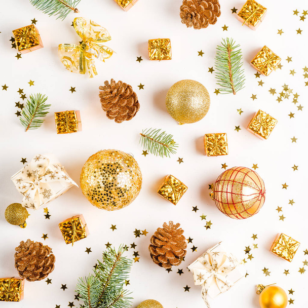 Christmas composition, balls, golden decorations on white background. Flat lay, top view, copy space - Photo, Image