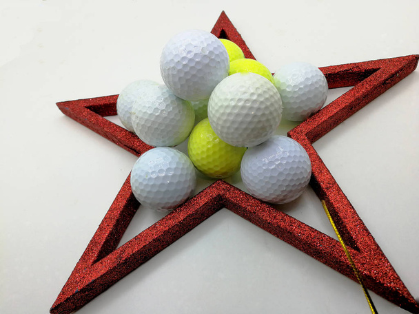 Joulukortti innoittamana golf kehystetty punainen tähti
 - Valokuva, kuva