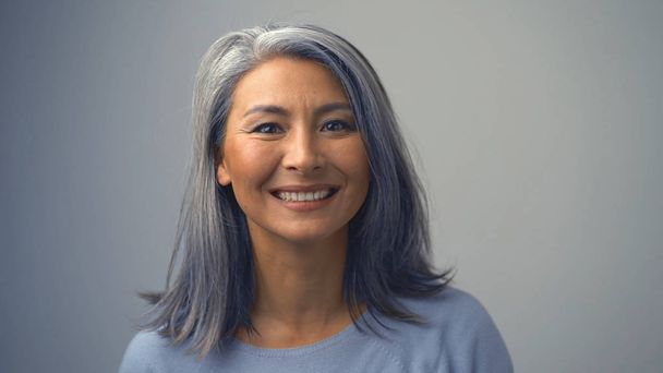 Good-looking Middle-Aged Woman Is Smiling Cheerfully - Photo, image
