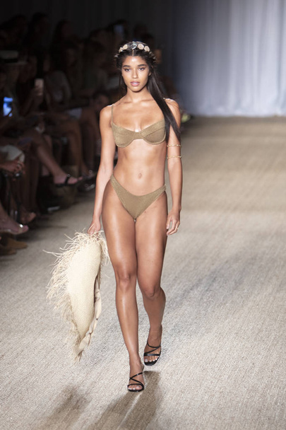 A model walks the runway for Monday Swimwear Summer collection 2020 fashion show during Paraiso Swim Week 2019 at Miami Beach in the Paraiso Runway Tent on July 11th, 2019 - Foto, Imagem