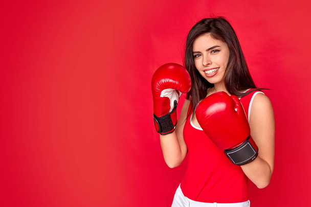 Cheerful fighter in boxing gloves - Foto, immagini