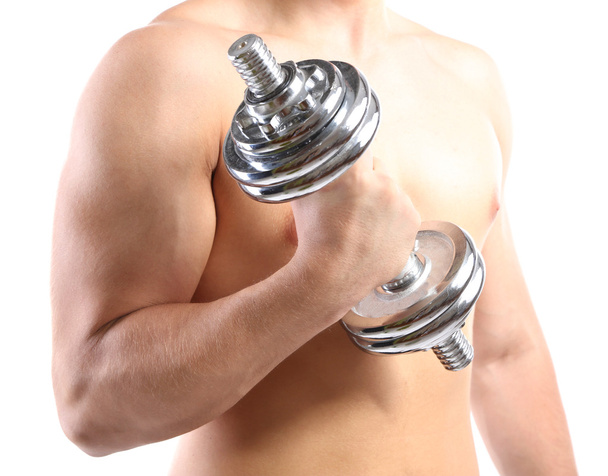 Handsome young muscular sportsman execute exercise with dumbbell, isolated on white - Fotografie, Obrázek