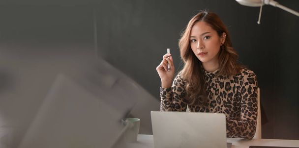 Attractive businesswoman working on  laptop computer  - 写真・画像