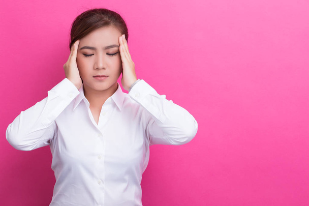 Aziatische vrouw heeft hoofdpijn - Foto, afbeelding