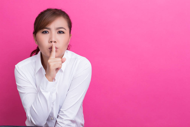 Asian woman make quiet gesture - Photo, Image