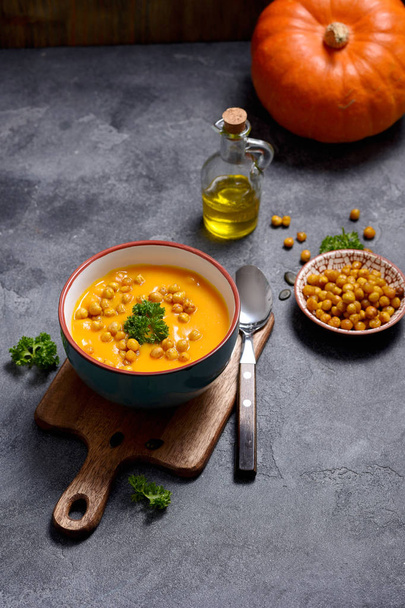 Pumpkin soup with baked chickpeas, healthy vegan eating - Photo, Image