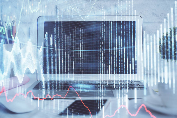 Stock market graph on background with desk and personal computer. Double exposure. Concept of financial analysis. - Valokuva, kuva
