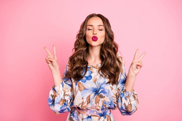 Portrait of her she nice-looking attractive lovely sweet flirty winsome lovable fascinating cheerful cheery wavy-haired lady showing v-sign kiss you isolated over pink pastel background - Фото, изображение