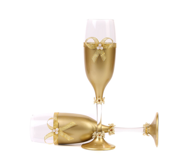 Decorated wedding golden glasses wuth bow. - Photo, image