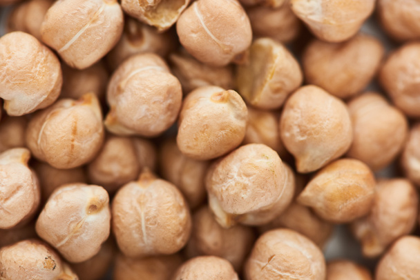 close up view of uncooked chickpea seeds - Fotó, kép