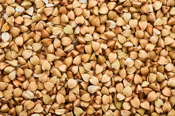 top view of uncooked organic buckwheat  - Valokuva, kuva