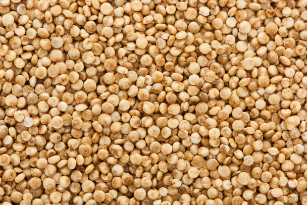 top view of uncooked seeds of organic white quinoa  - Valokuva, kuva