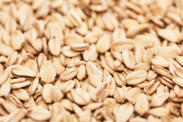 close up view of uncooked pressed organic oats - Foto, Imagem