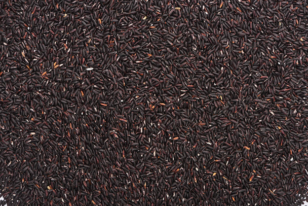 vista superior del arroz negro orgánico crudo
 - Foto, imagen