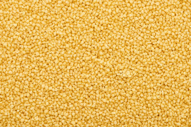 top view of raw organic couscous groat - Фото, зображення