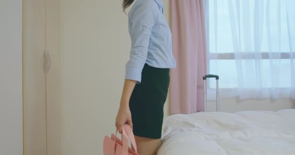 businesswoman feel tired on bed - Materiał filmowy, wideo