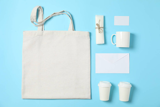 Flat lay composition with cotton bag, paper cups and office supp - Photo, Image
